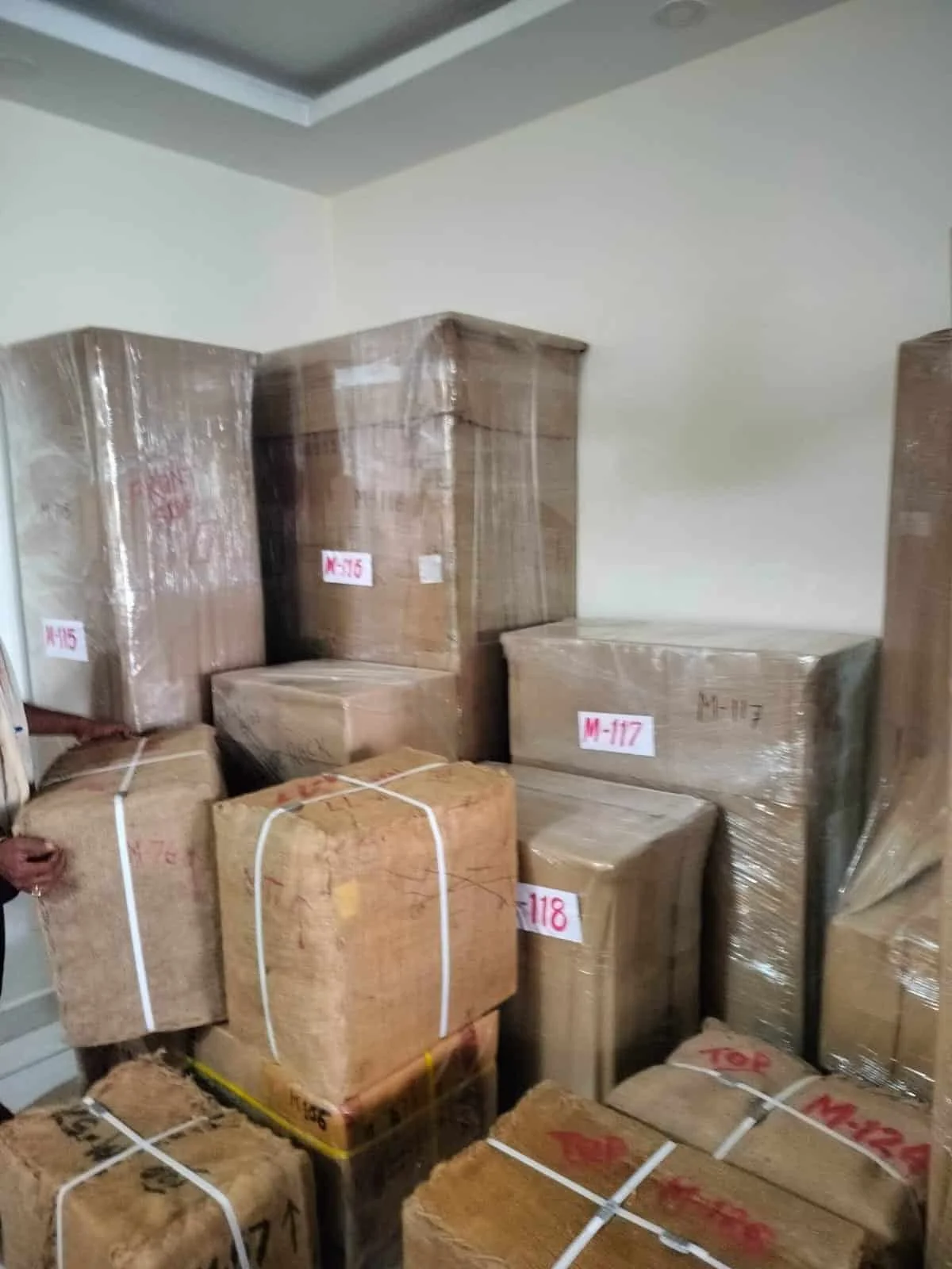 Packed boxes ready for moving by Sharma Packers and Movers.